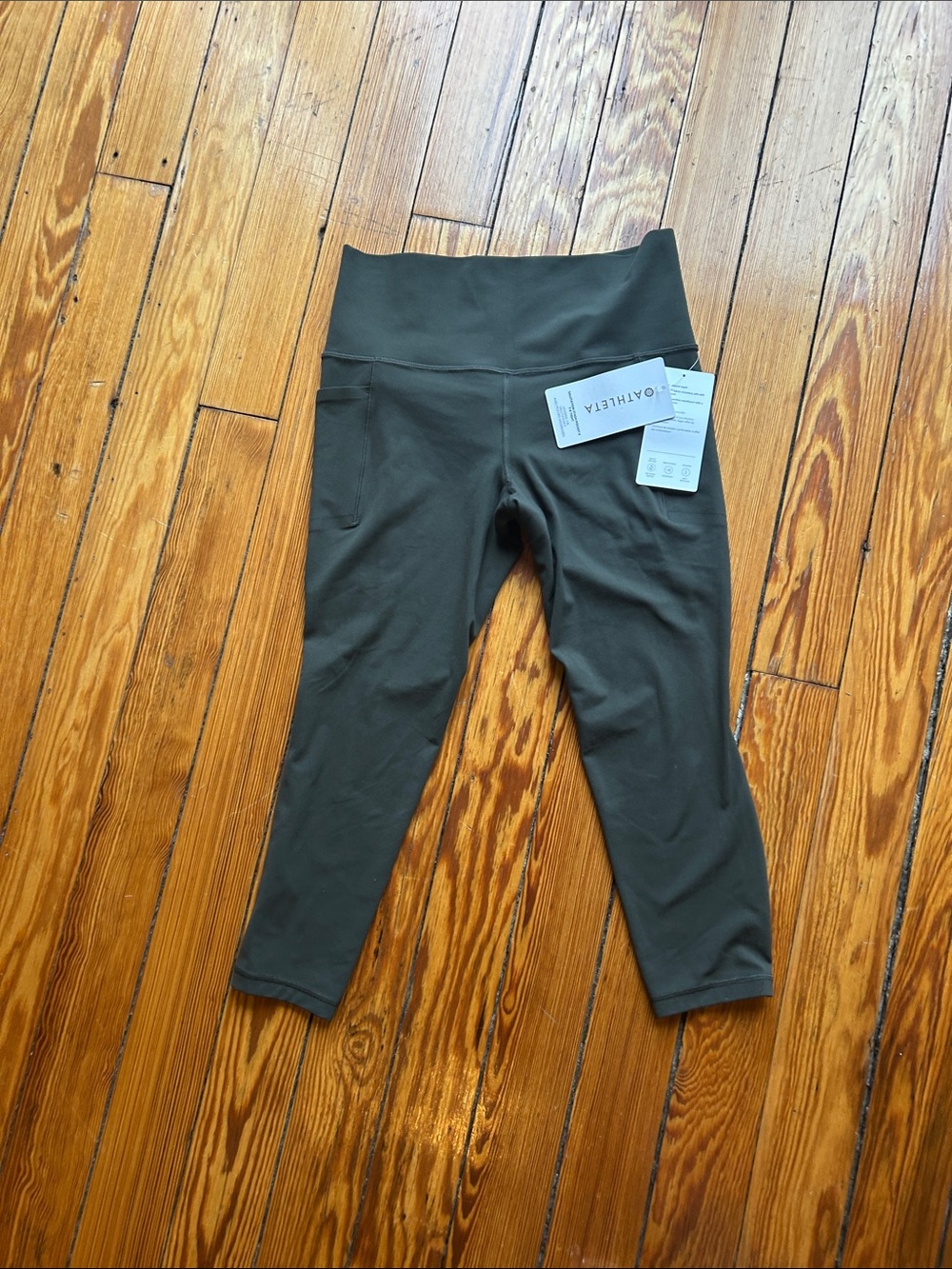Athleta salutation stash pocket 2
7/8 tight Olive Green  
Medium (P) NWT